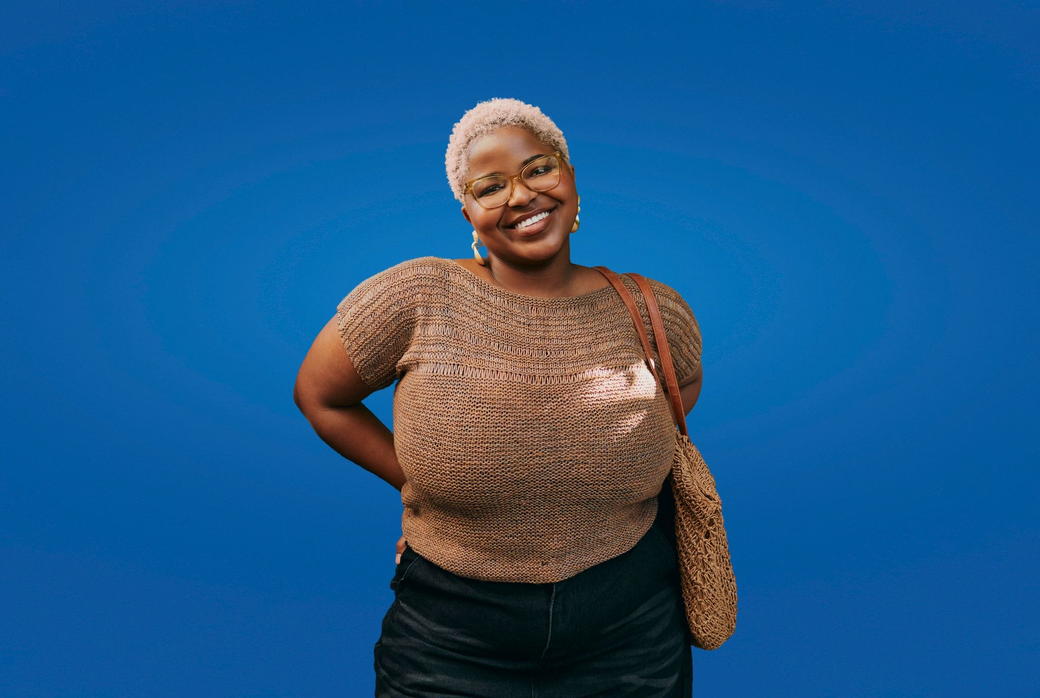 Smiling Black woman portrait representing a satisfied client